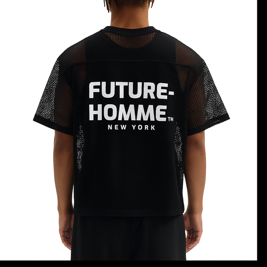 Model wearing the sustainable Future-Homme activewear boxy mesh tee with macro logo on the backside in black on a white background