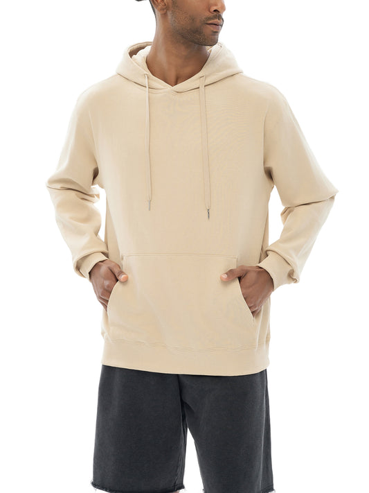 Model wearing the sustainable Future-Homme daily uniform classic cotton hoodie in apricot frontside on a white background