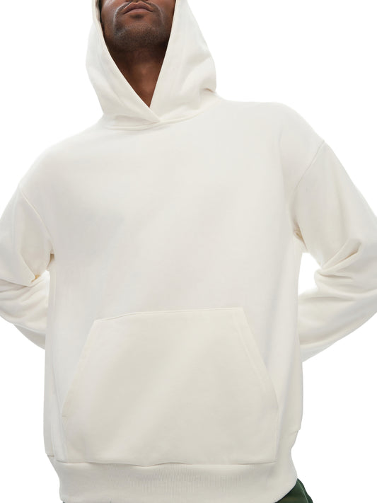 Model wearing the white sustainable 460 GSM Future-Homme daily uniform structured hoodie on a white background