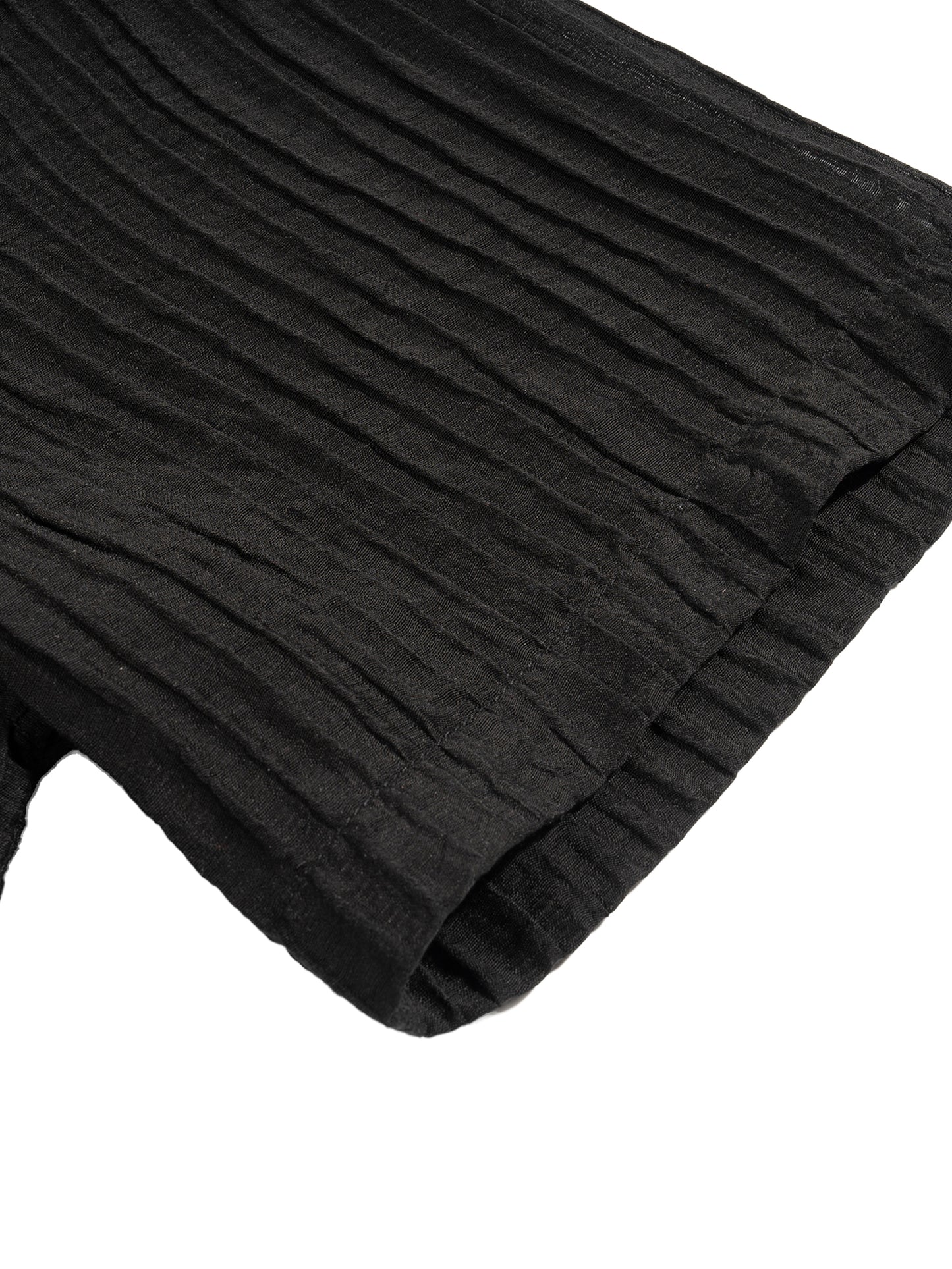 Flat lay of the sustainable Future-Homme daily uniform, tencel jacquard button down in black frontside sleeve on a white background