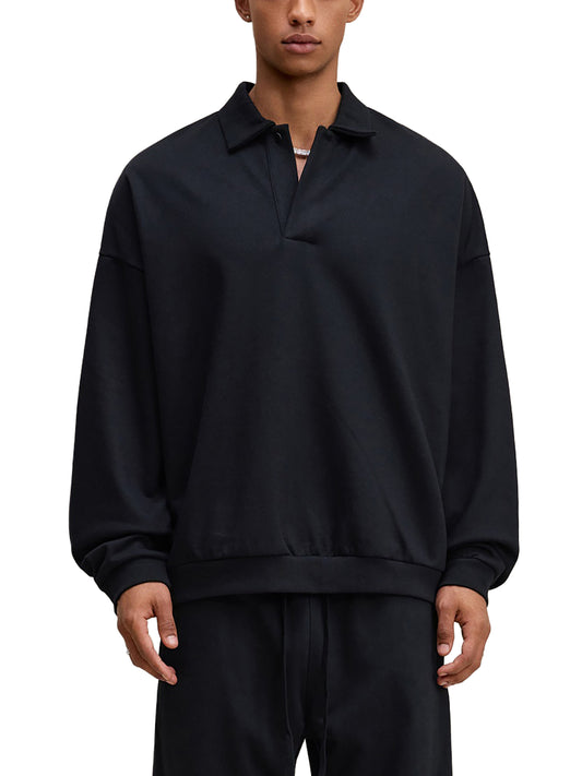 A Future-Homme model wearing a Fleece Please Heavyweight Polo Sweatshirt in black outfit on a white background