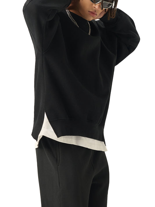 Future-Homme model wearing a Fleece Please Side Slit Pullover from a side view on a white background.