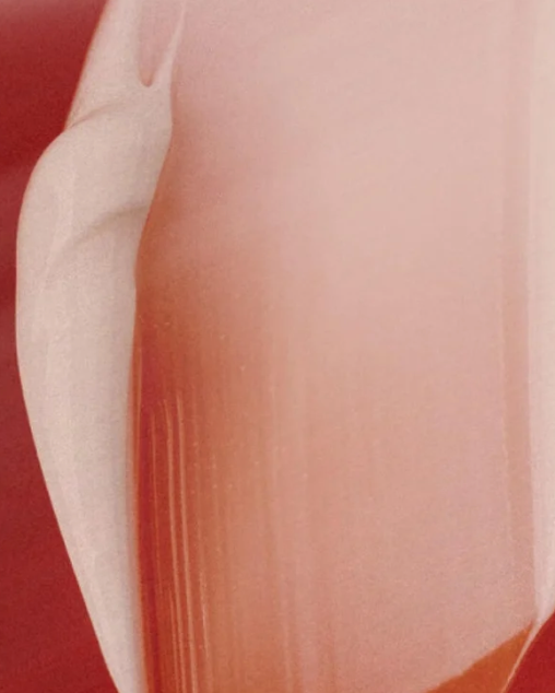 Smear of anti age day cream on skin.