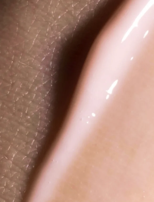 Close up of skin and product texture of the Future-Homme plus skin peptide anti age serum.