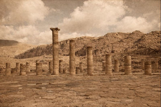 column ruins within a mountain range. 