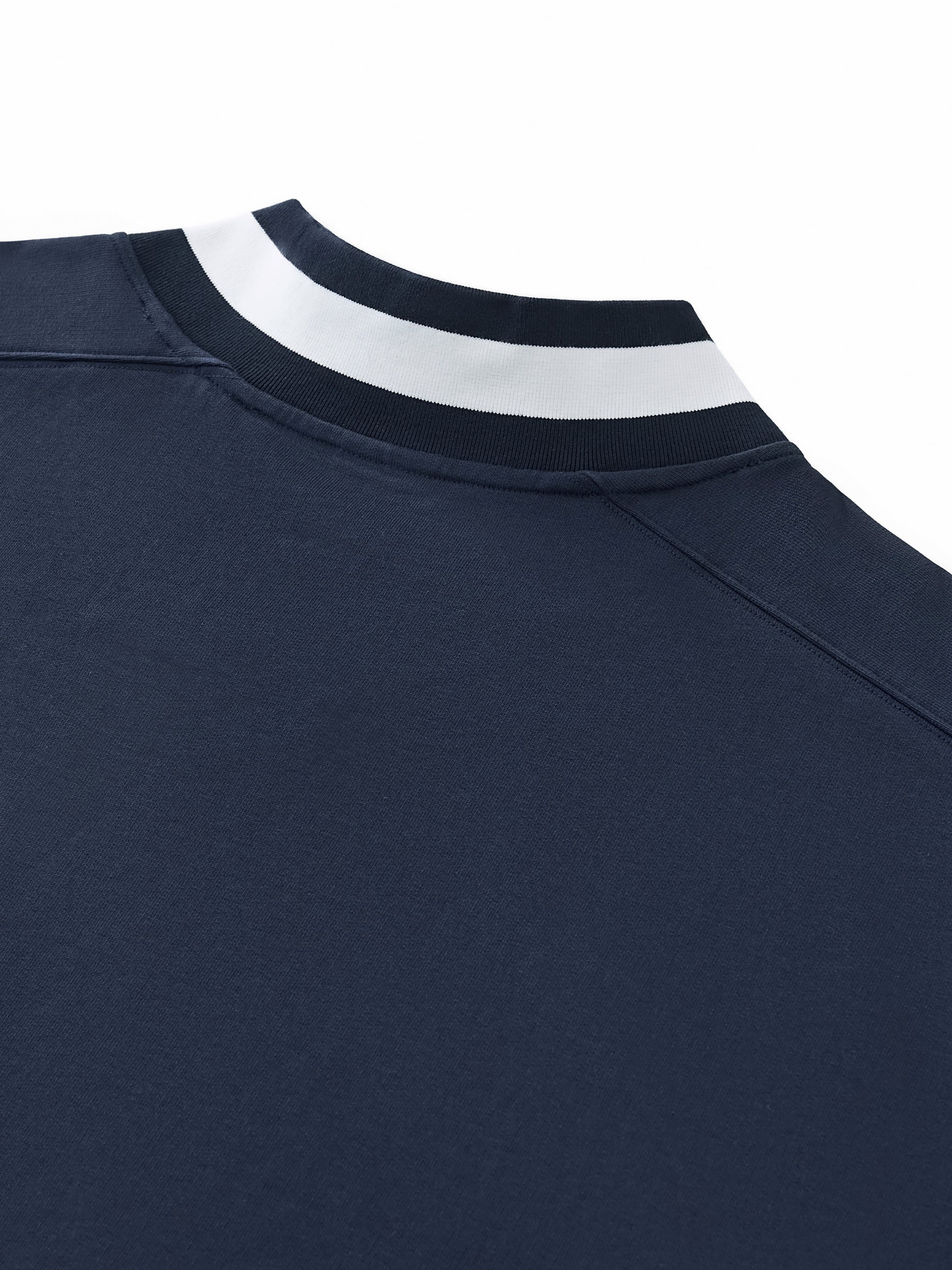 Flat lay of the Future-Homme track v-neck sweatshirt 380 GSM sustainable in navy backside collar  close-up on a white background. 