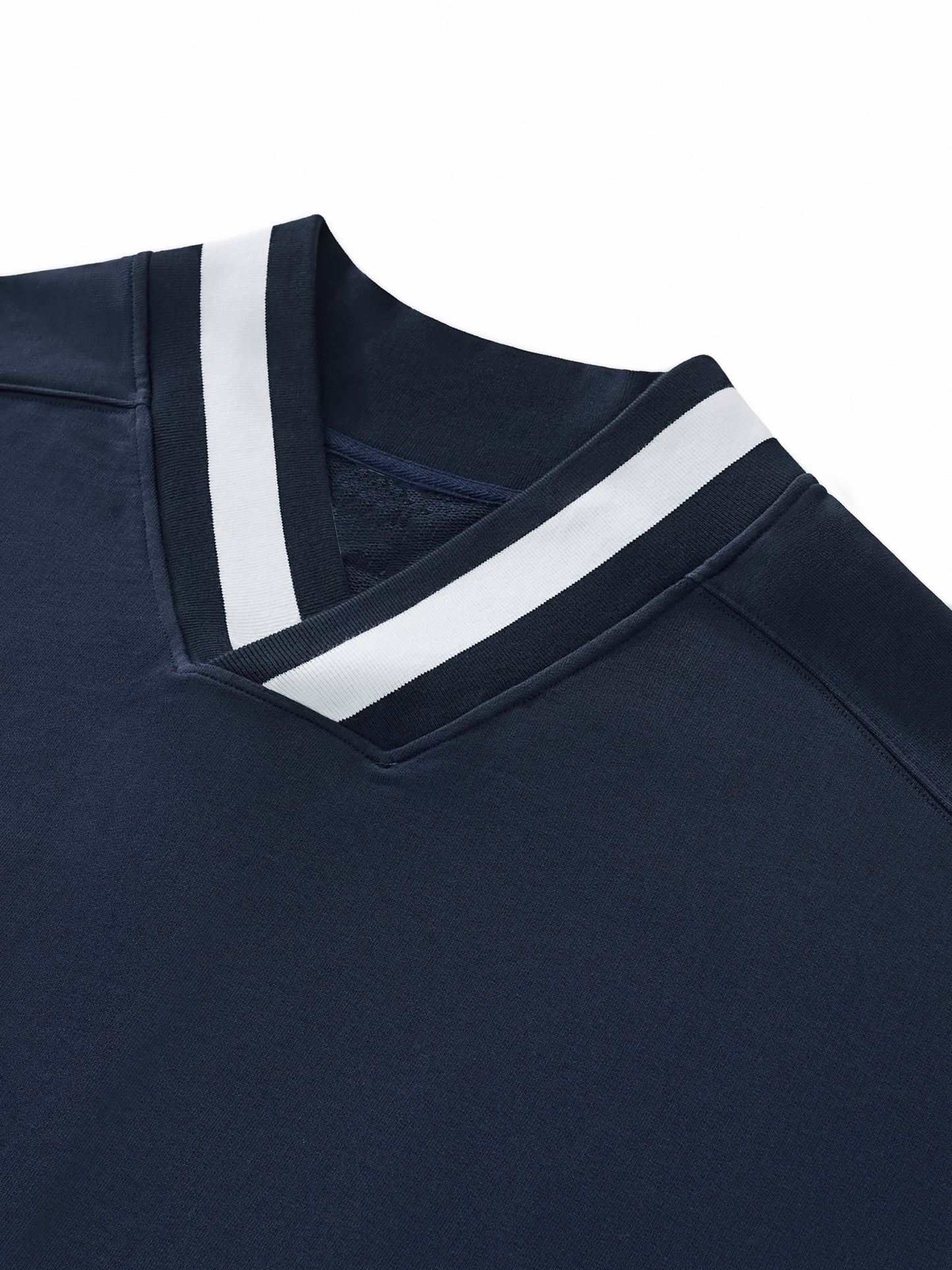 Flat lay of the Future-Homme track v-neck sweatshirt 380 GSM sustainable in navy v-neck close-up on a white background. 