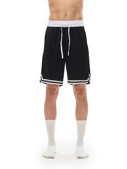 Lower half of model wearing the sustainable Future-Homme activewear classic stripe trim basketball short in black front side view on a white background