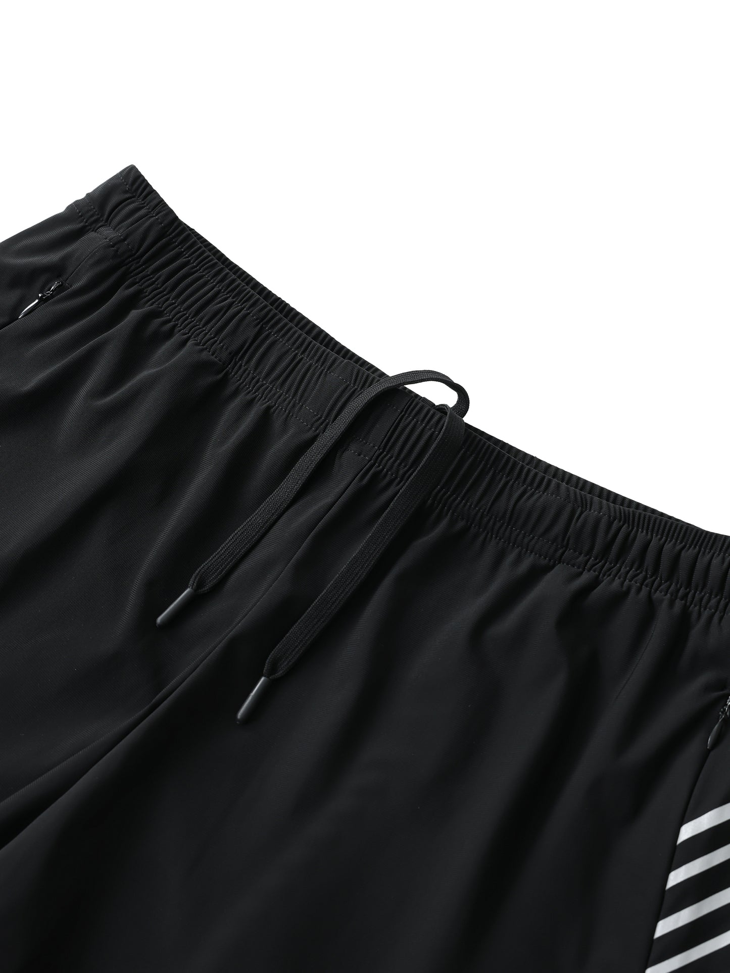 Flat lay of the Future-Homme activewear side stipe performance shorts sustainable in black with white stripes frontside waistband on a white background.