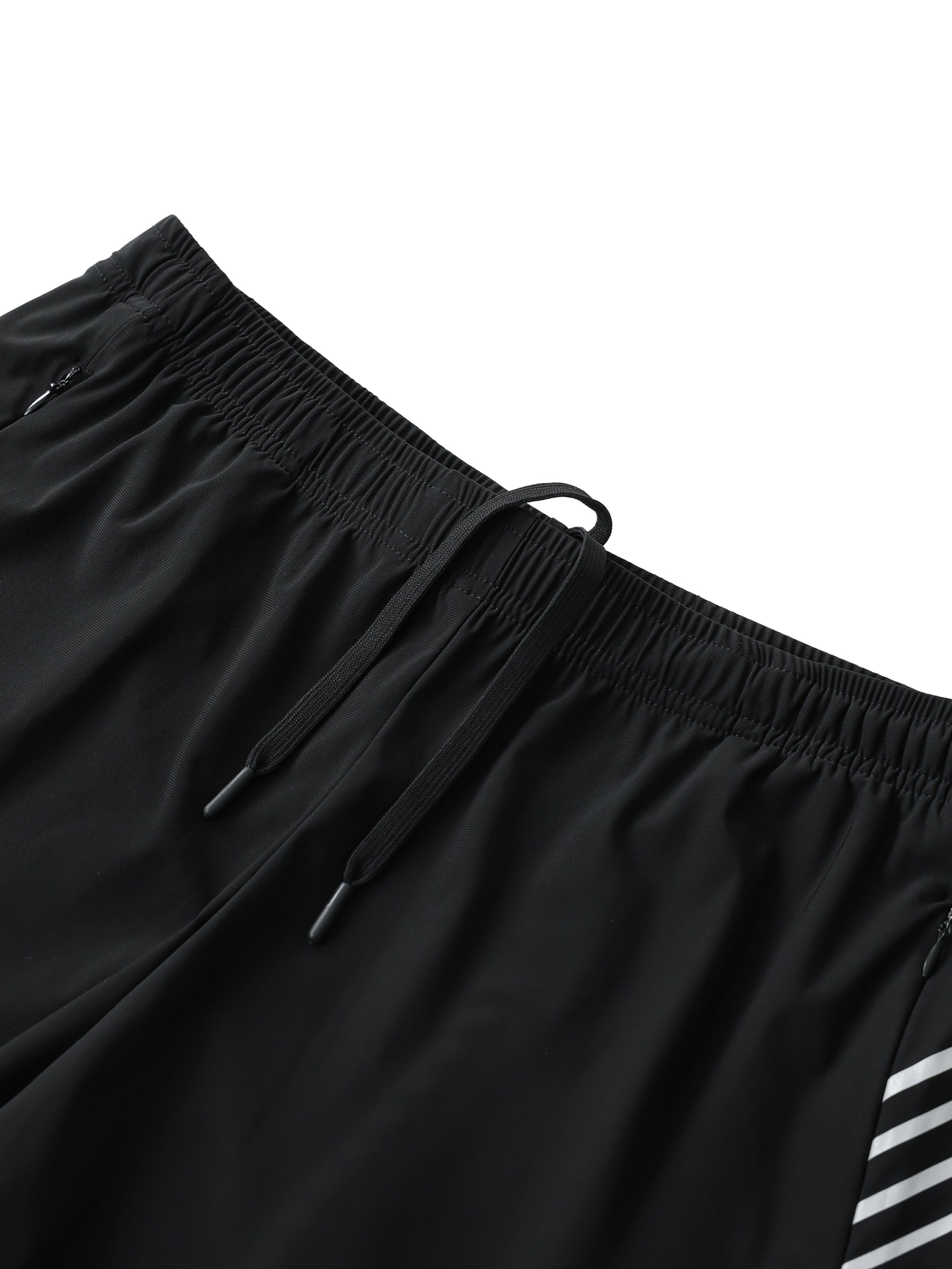 Flat lay of the Future-Homme activewear side stipe performance shorts sustainable in black with white stripes frontside waistband on a white background.