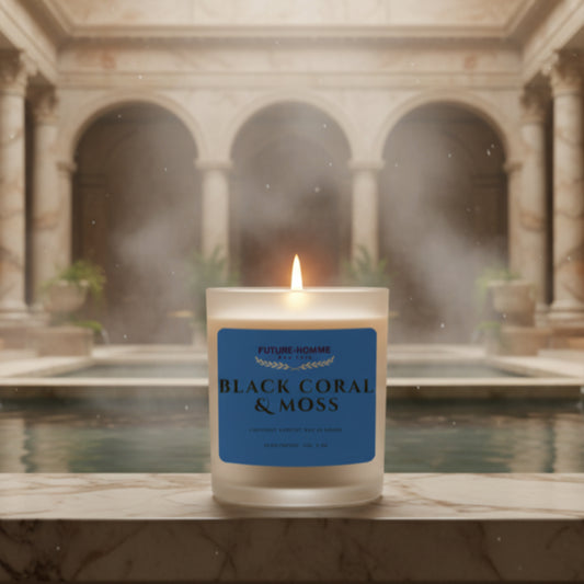 Candle labeled 'Black Coral & Moss' in front of a classical architecture setting with columns and water.