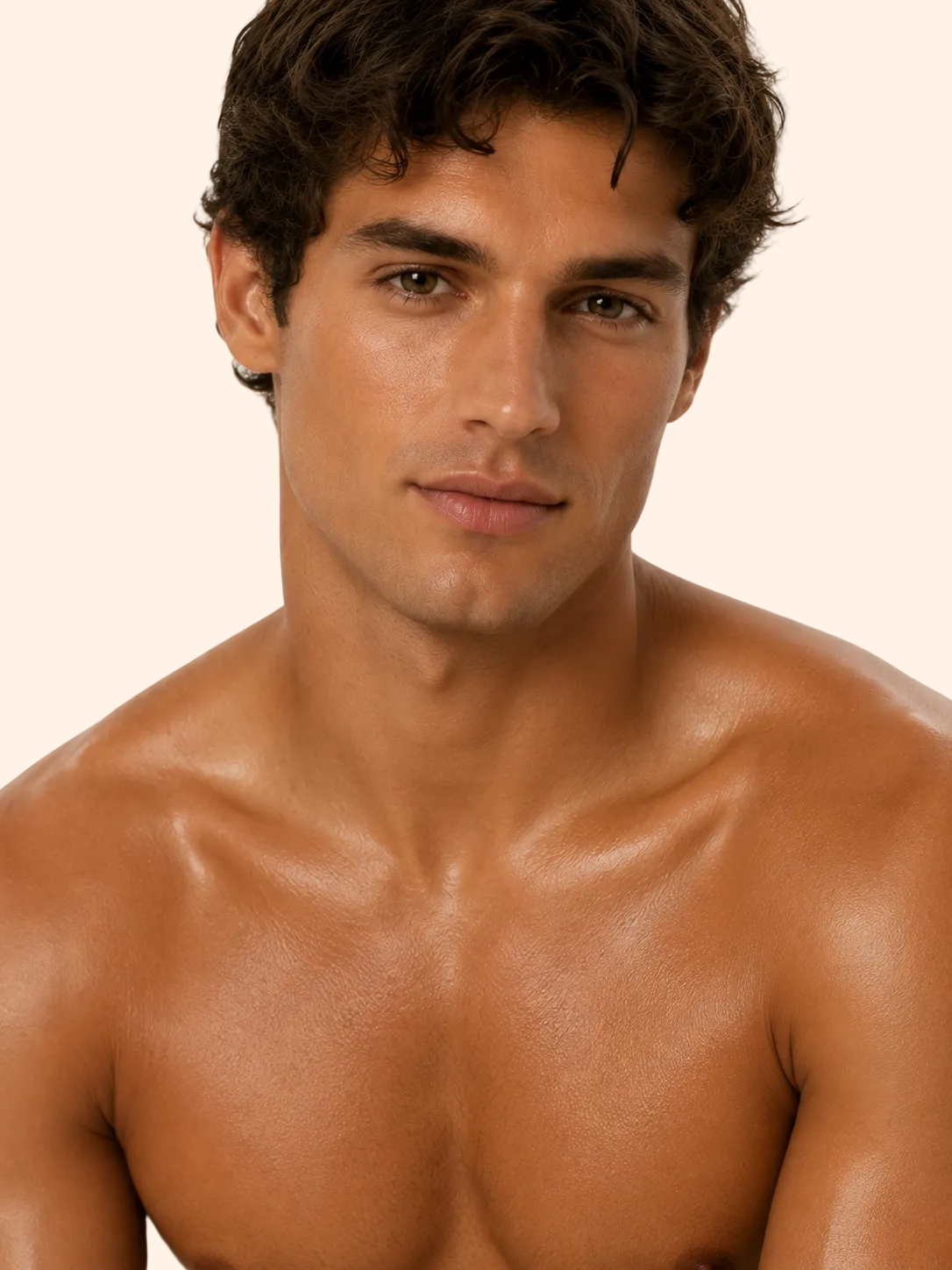 Man with a well-defined muscular build on a plain background