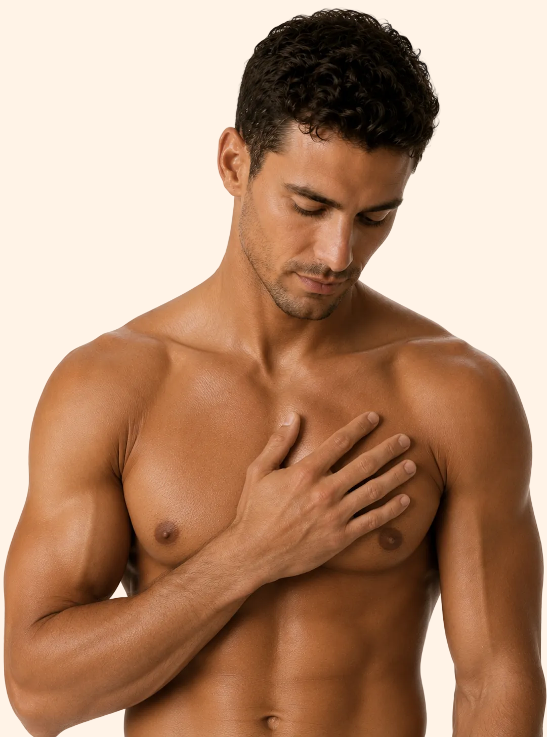 Man with a muscular build touching his chest against a plain background