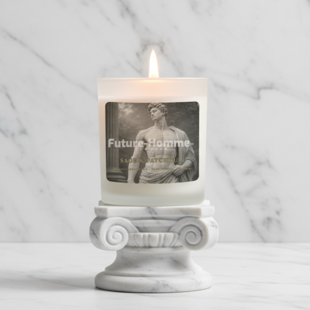 Candle with a decorative holder on a marble surface