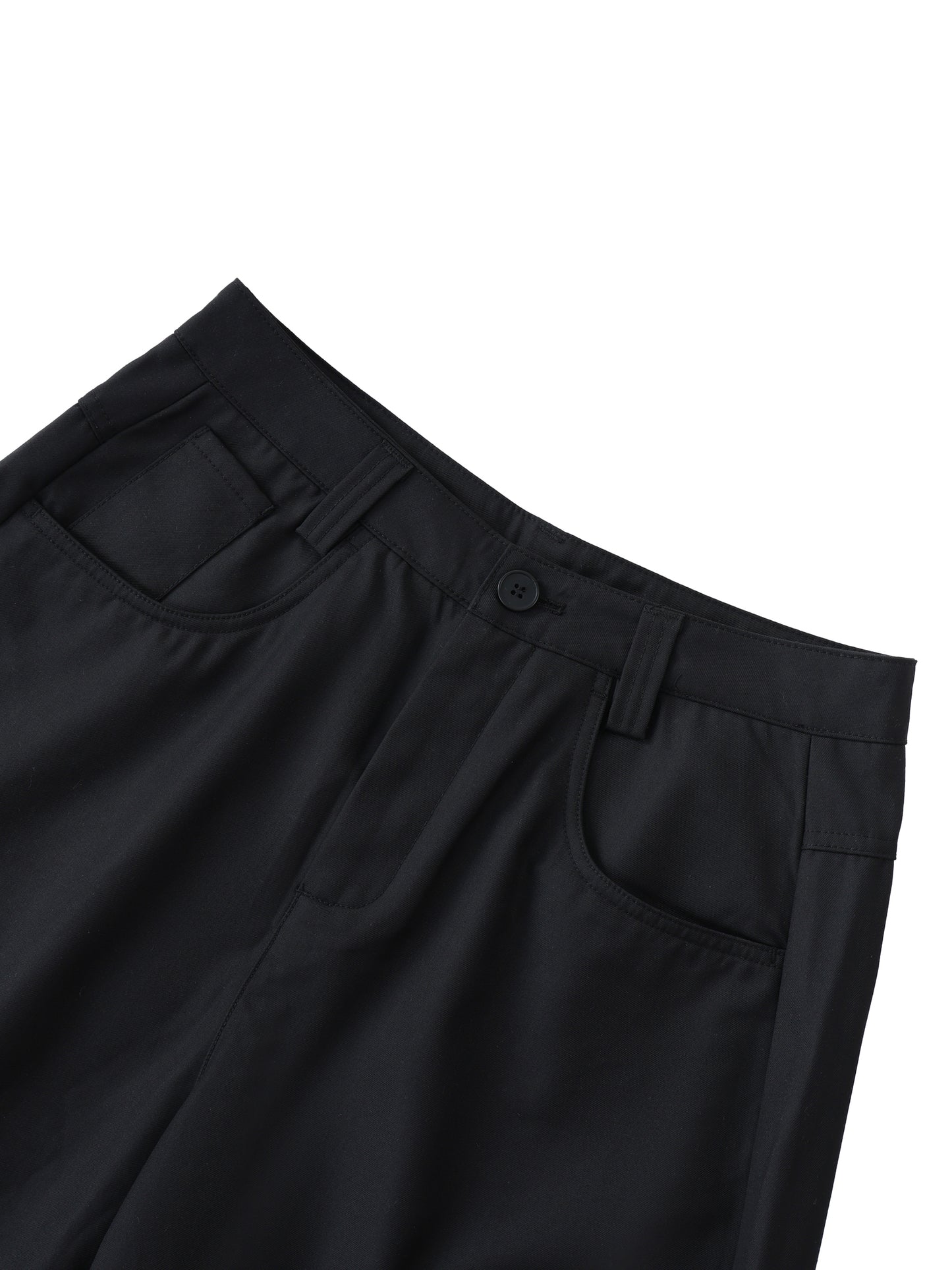 Flat lay of the black barrel pant front side up-close pockets -Future-Homme