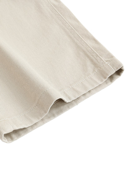 Flat lay close up shot of the Future-Homme heavyweight cotton straight leg pants sustainable 360 GSM in pale khaki pant leg on a white background 