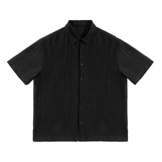 Flat lay of the sustainable Future-Homme daily uniform, tencel jacquard button down in black frontside on a white background