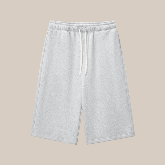 A Future-Homme three quarter length sweatpant in 350 GSM in Flower Gray, showing the Front Side on a White background.