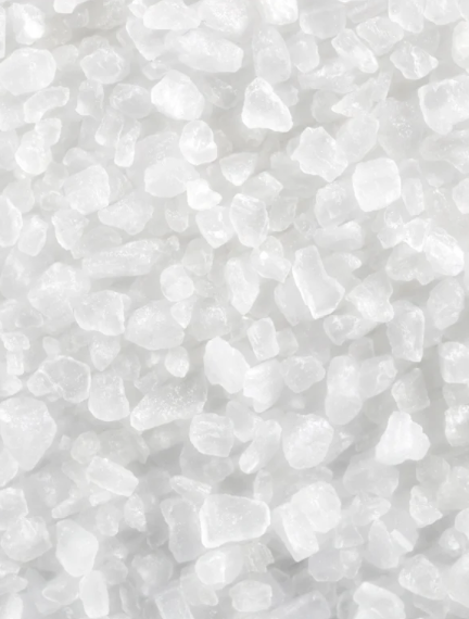 Close-up of white pebbles on a white background