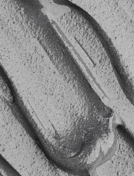 Close-up of  textured clay mask products