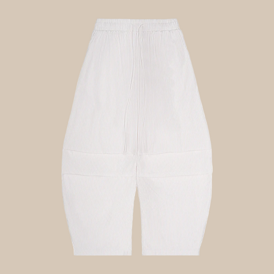 White ribbed pants on a white background