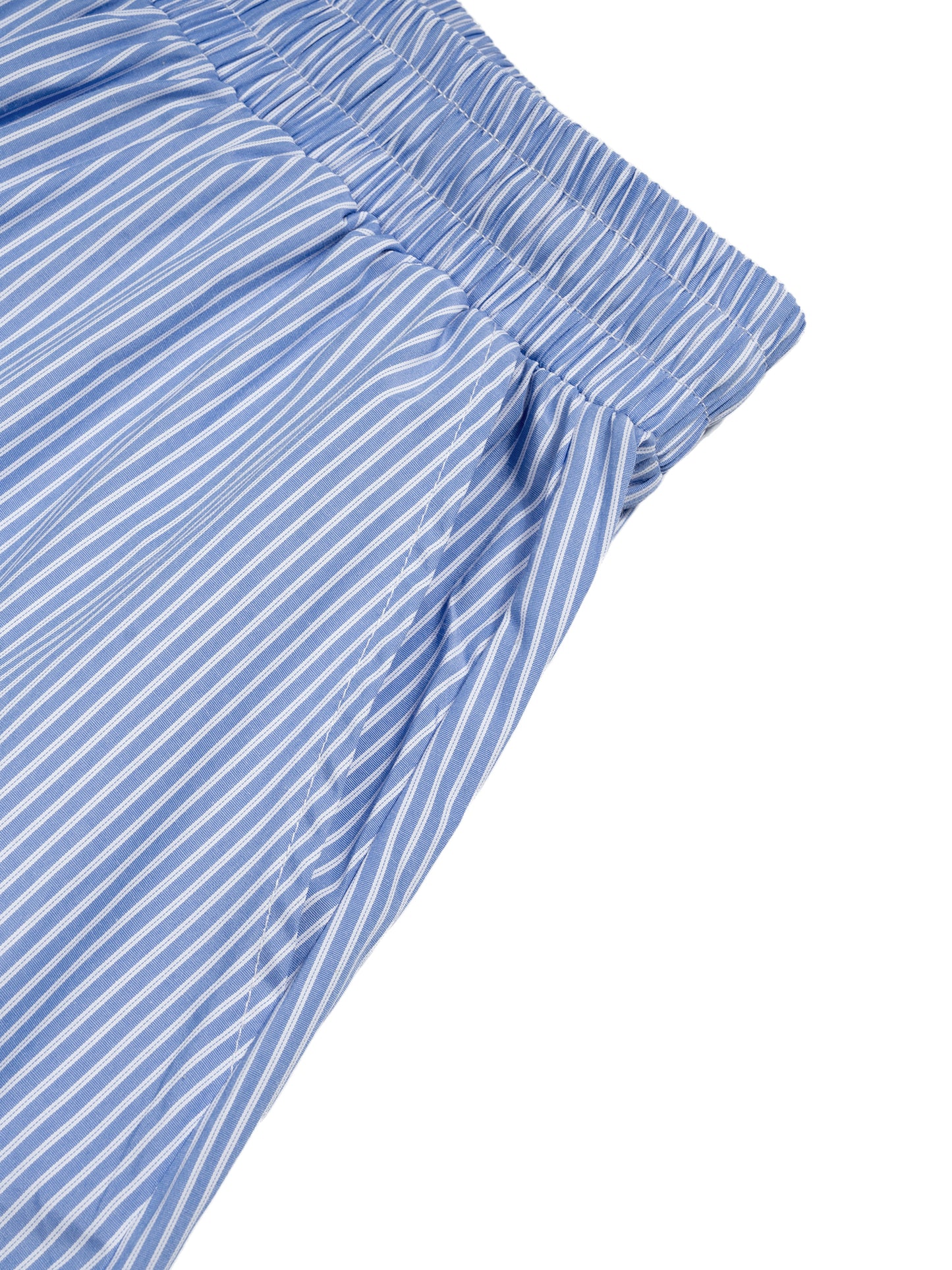 Close-up of blue and white striped shorts on a white background