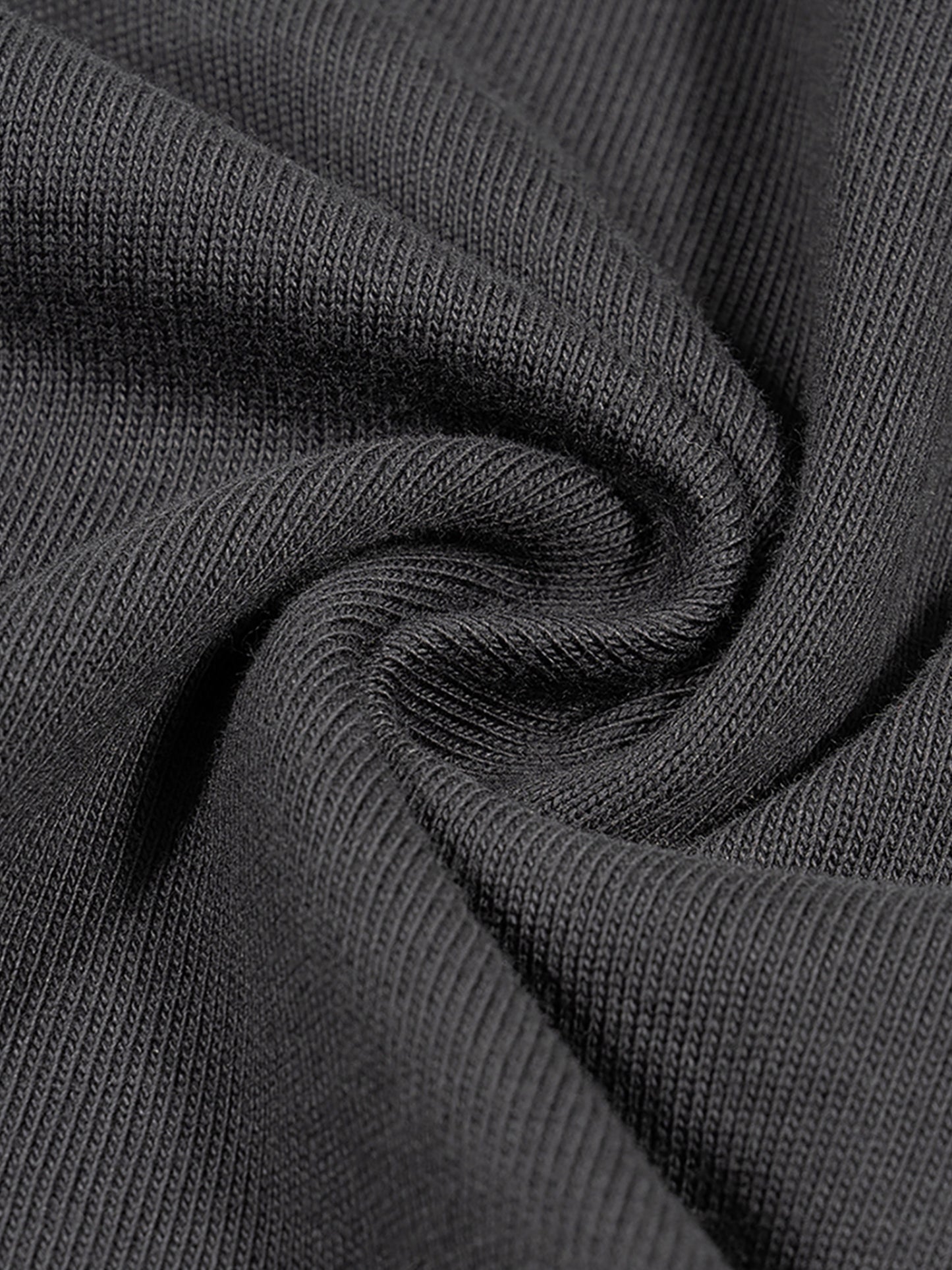 Close-up of dark gray fabric with visible texture