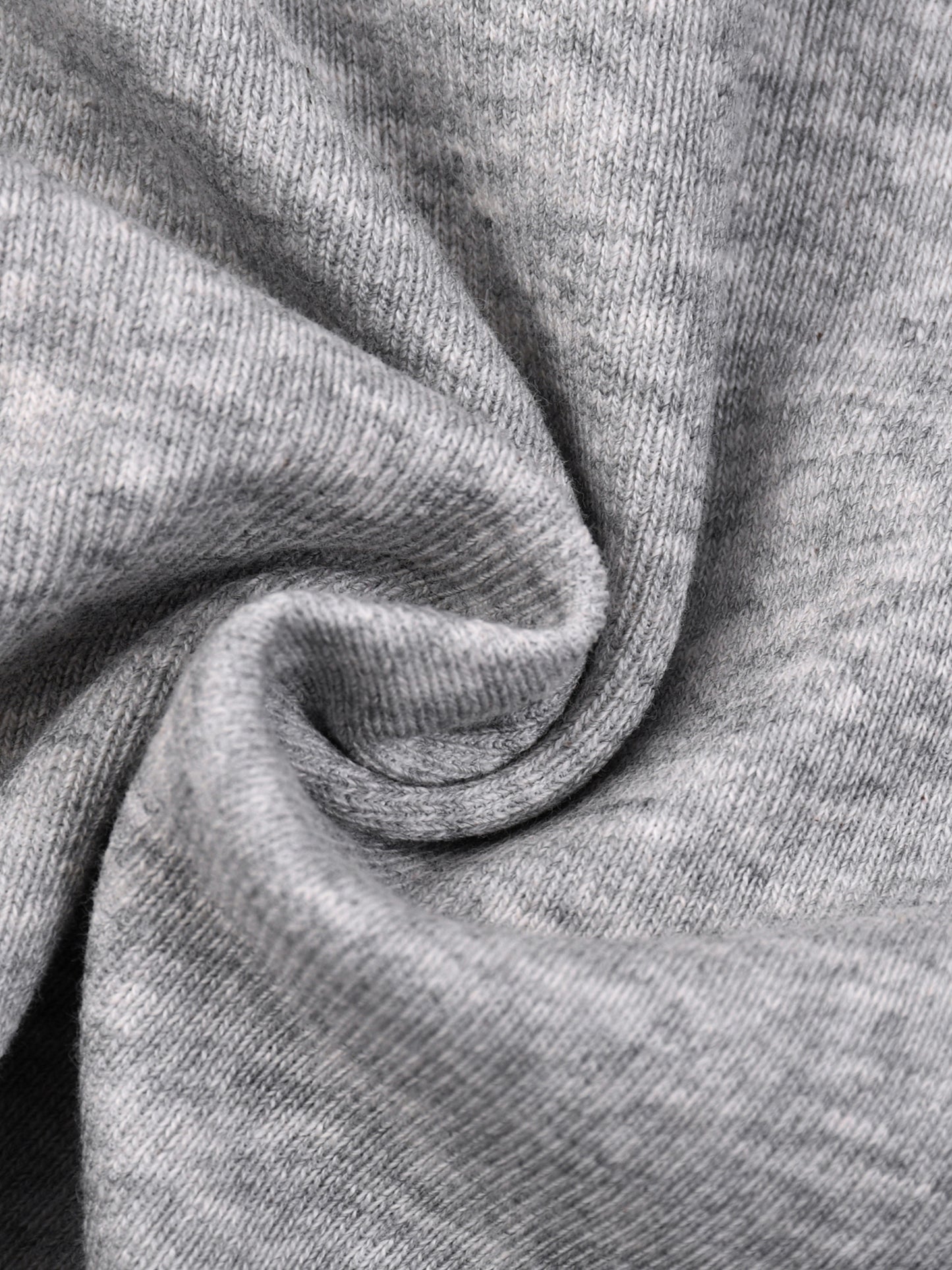 Close-up of gray fabric with a textured pattern