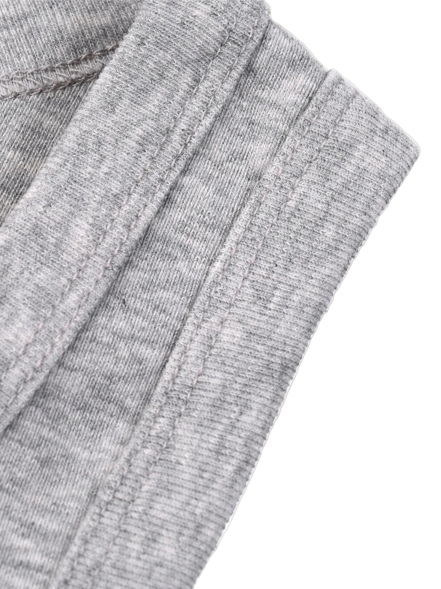 Close-up of gray fabric with a textured pattern on a white background