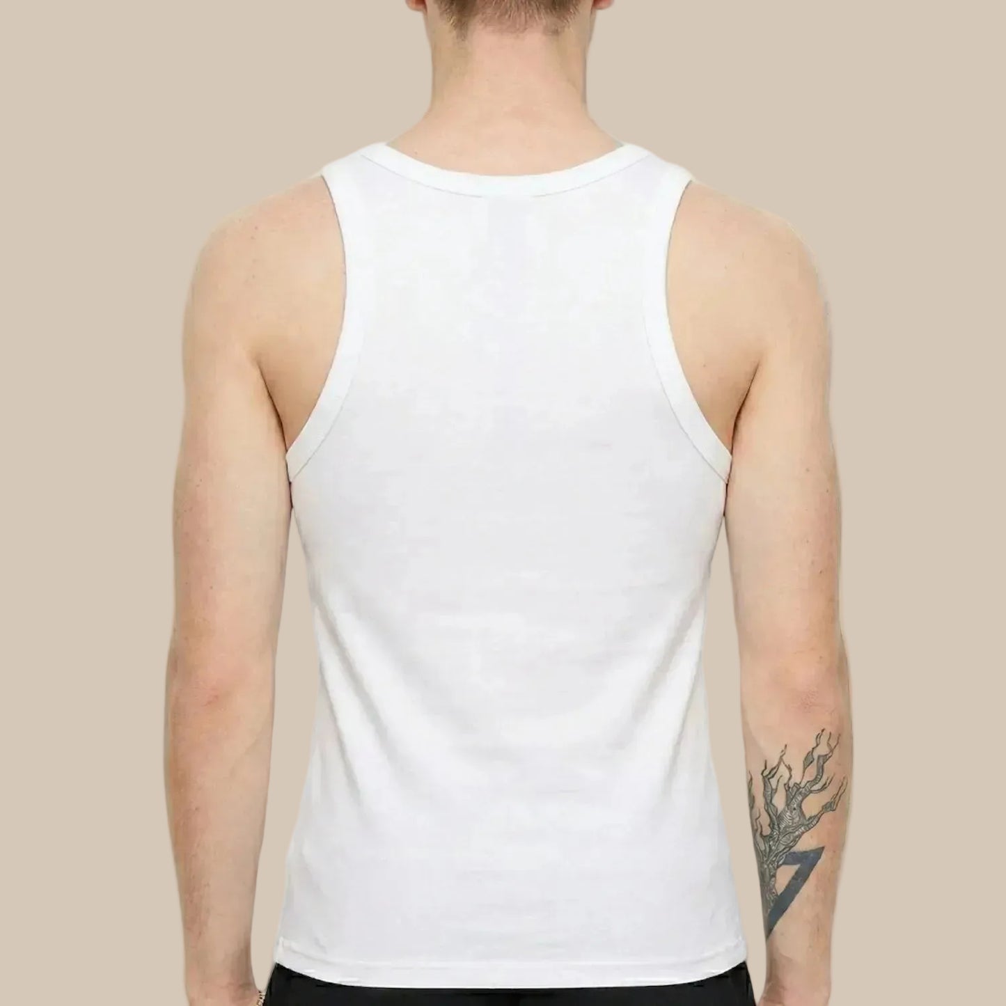 Person wearing a white tank top on a plain background