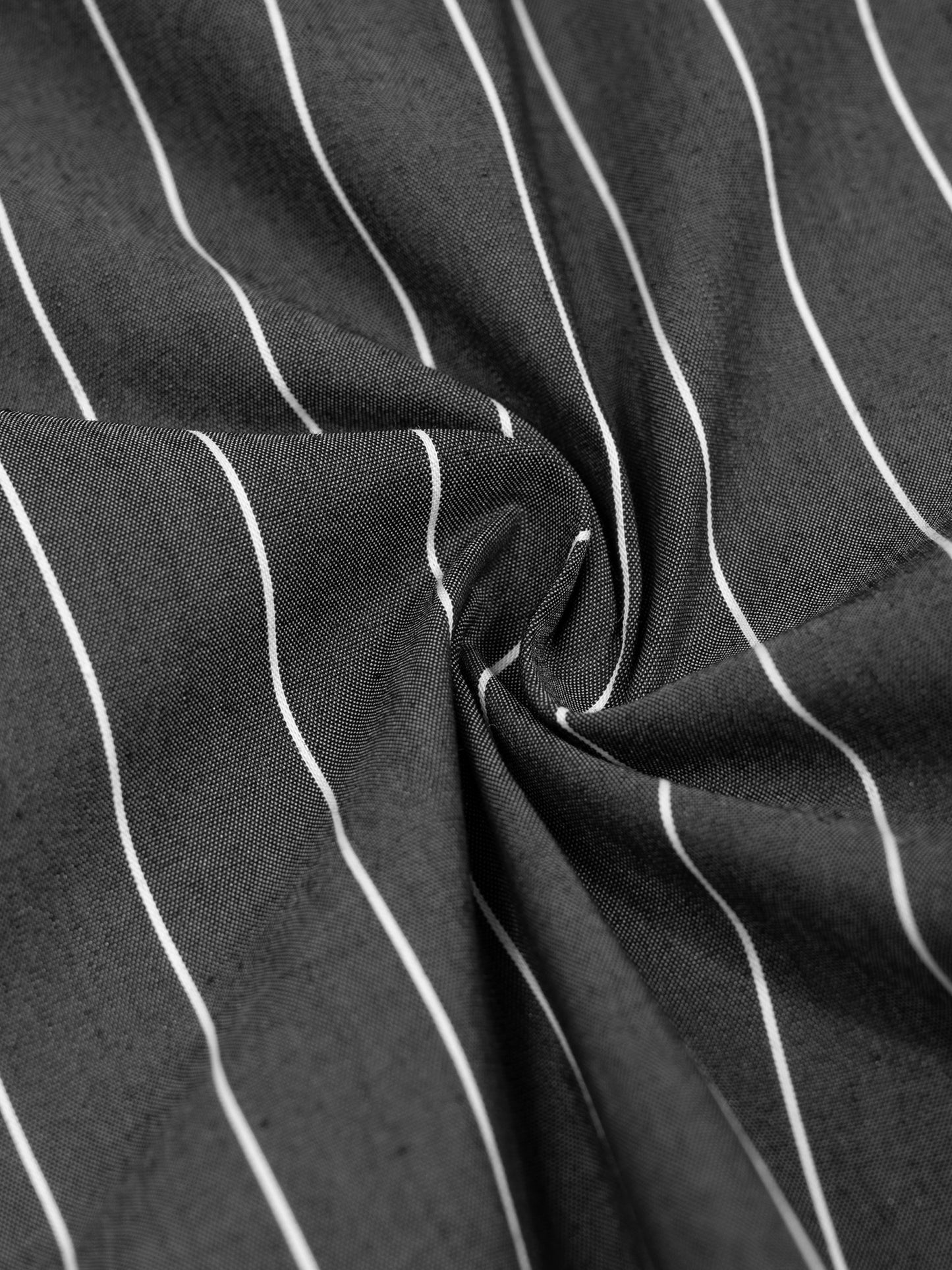 Close-up of black fabric with white stripes