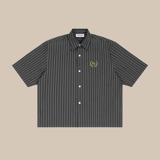 Black and white striped shirt with a logo on a white background