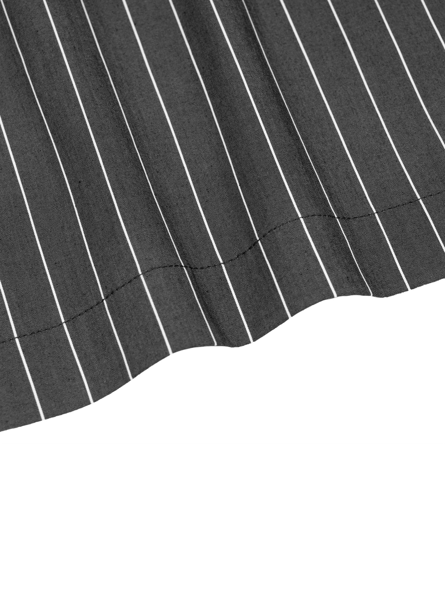 Close-up of a black fabric with white pinstripes on a white background