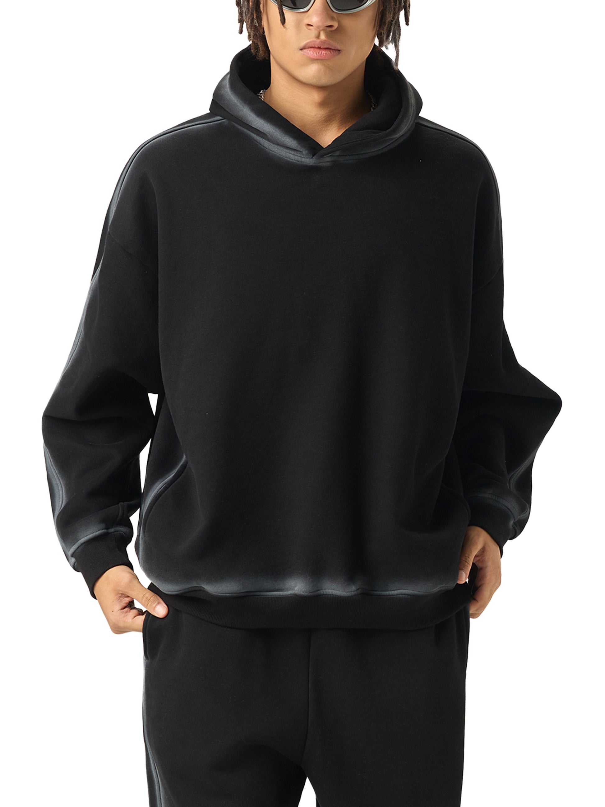 Model wearing the Future-Homme Fleece Please Hoodie in black with white chalk trim front side on a white background 