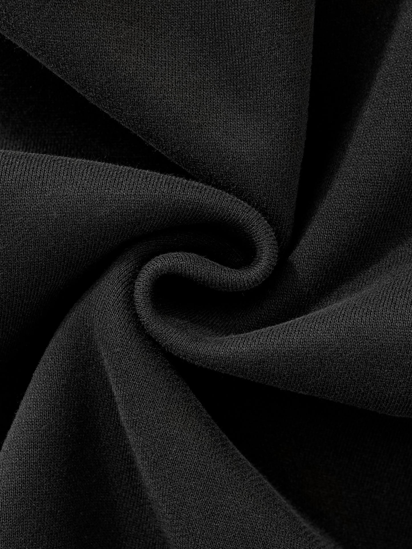 Future-Homme Fleece PleaseClose-up of black fabric with a subtle texture