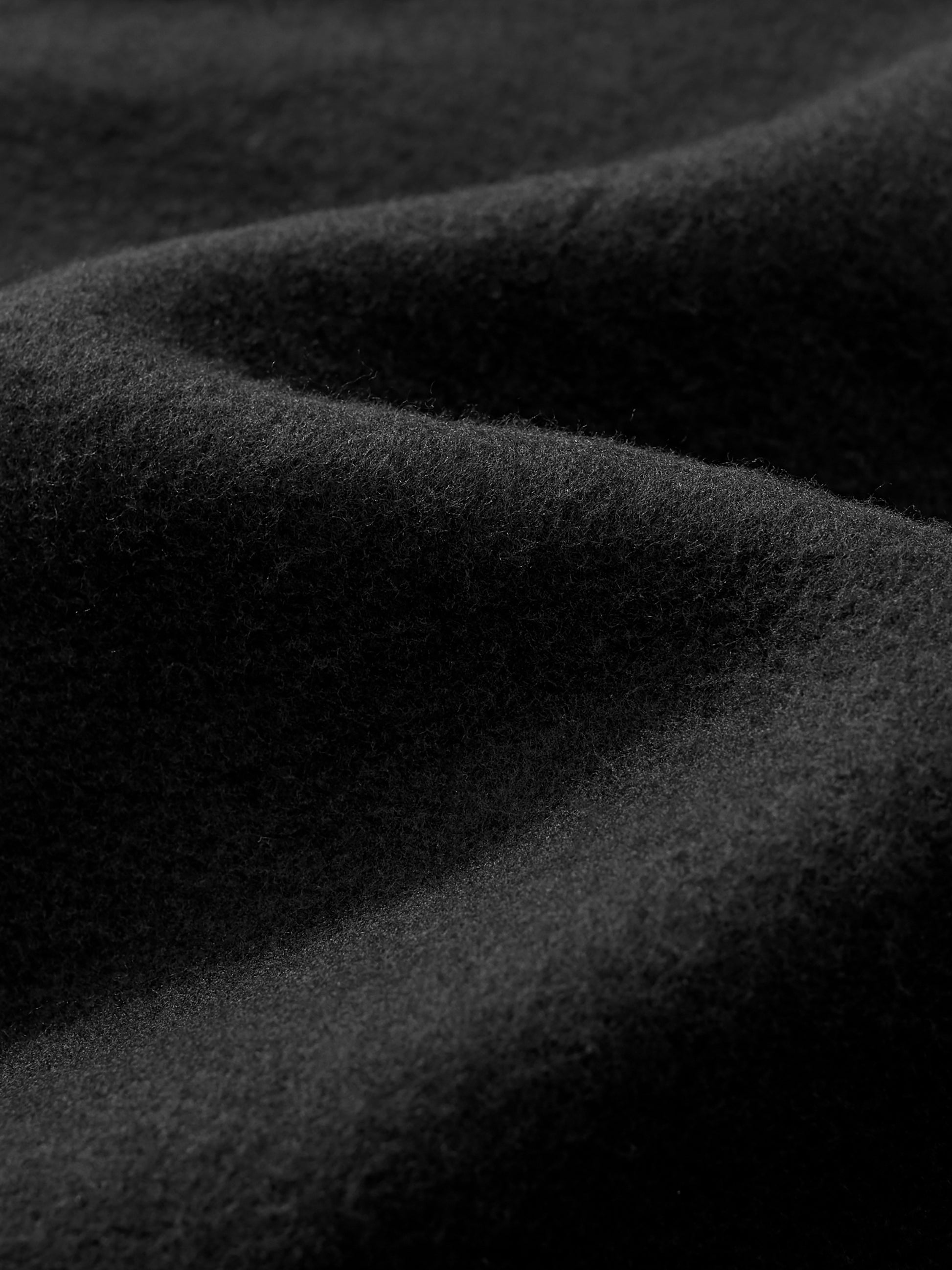 Future-Homme Fleece Please Close-up of dark gray fabric texture interior