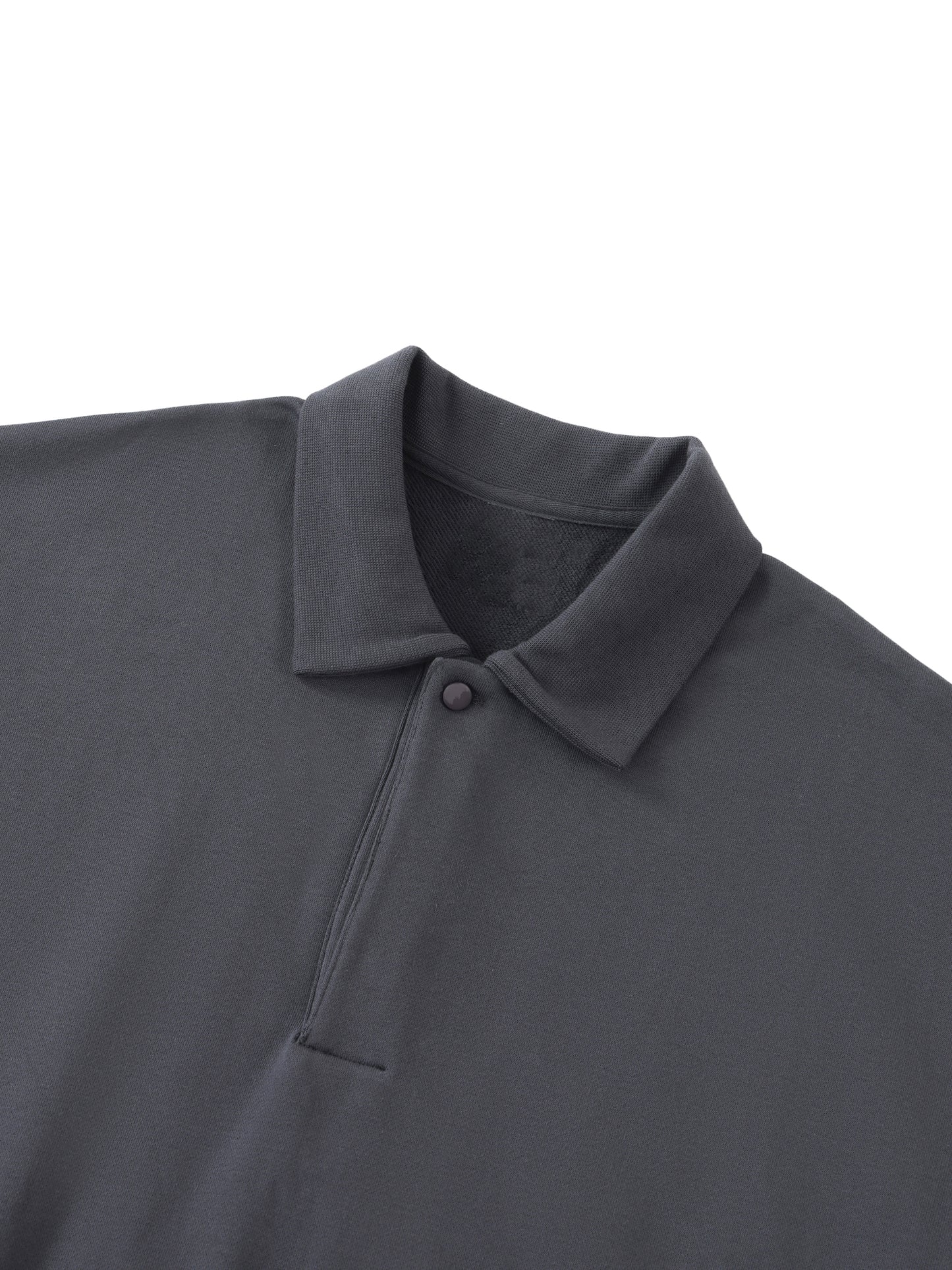 Future-Homme Fleece Please Heavyweight Polo Sweatshirt in black close up shot of collar, placket and covered button on a white background. 