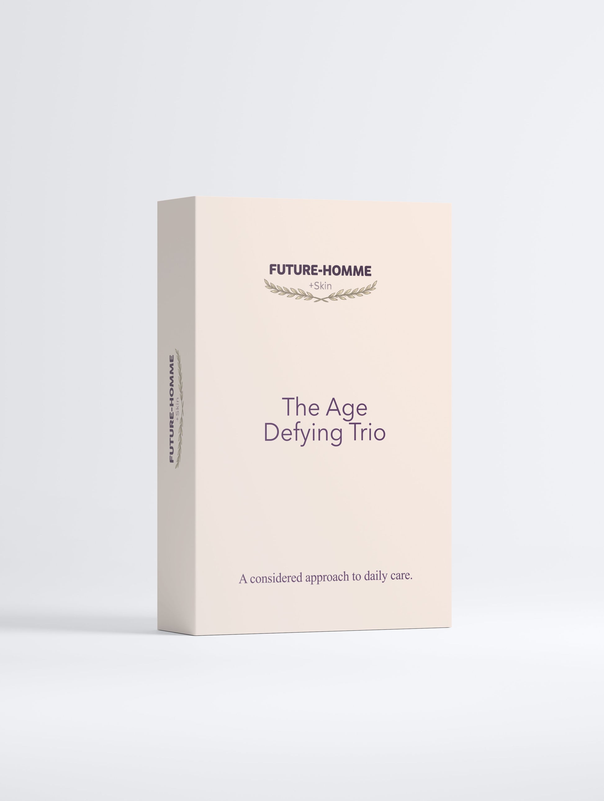 Beige box labeled 'The Age Defying Trio' by Future-Homme on a light gray background