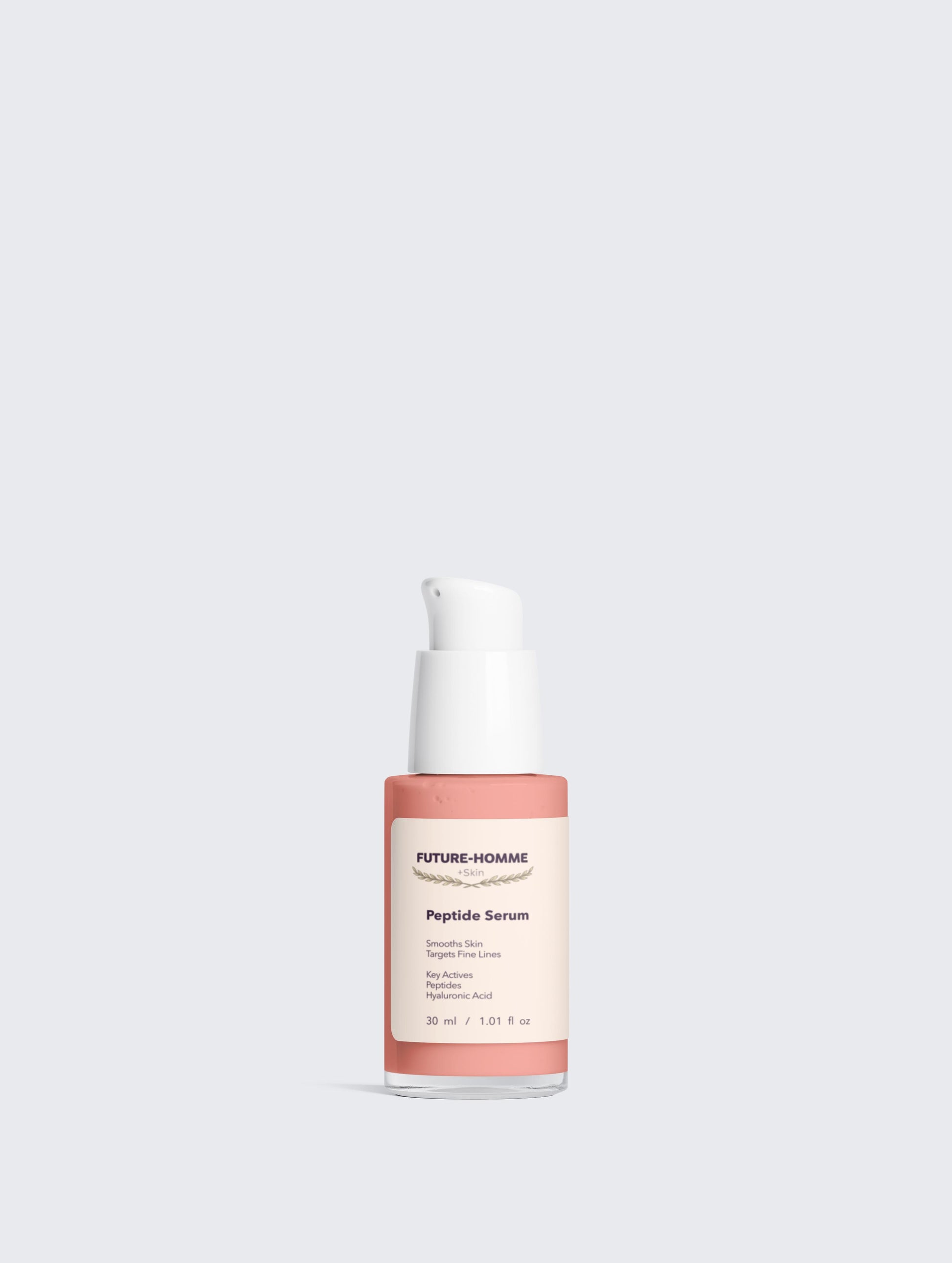 Skincare serum bottle labeled 'FUTURE-HOMME' on a light gray background