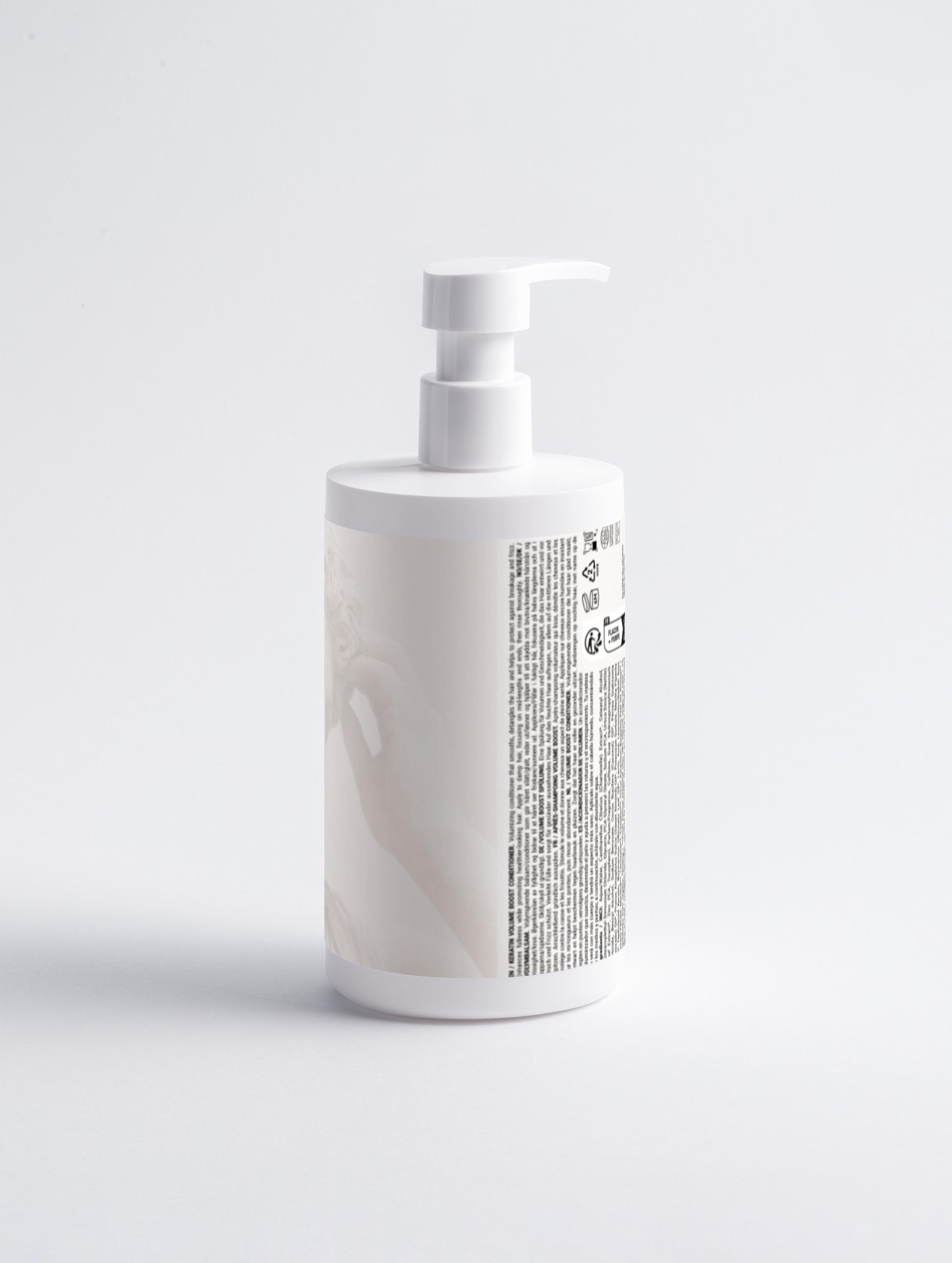 White bottle with a pump on a light gray background