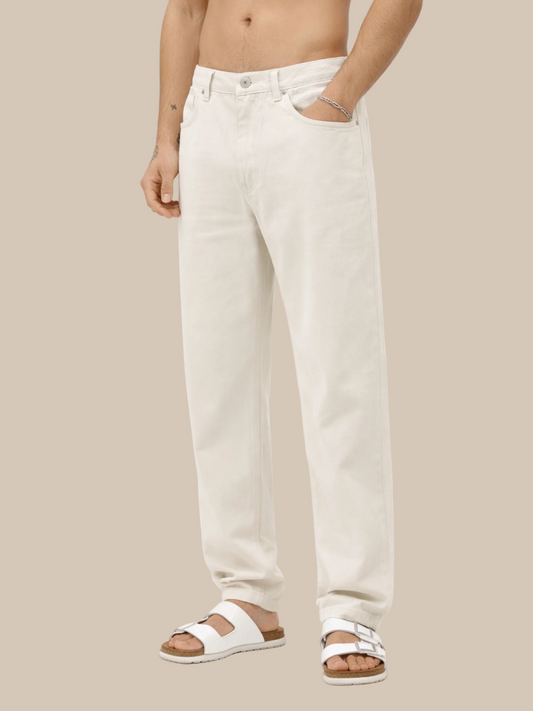 Person wearing white jeans on a white background