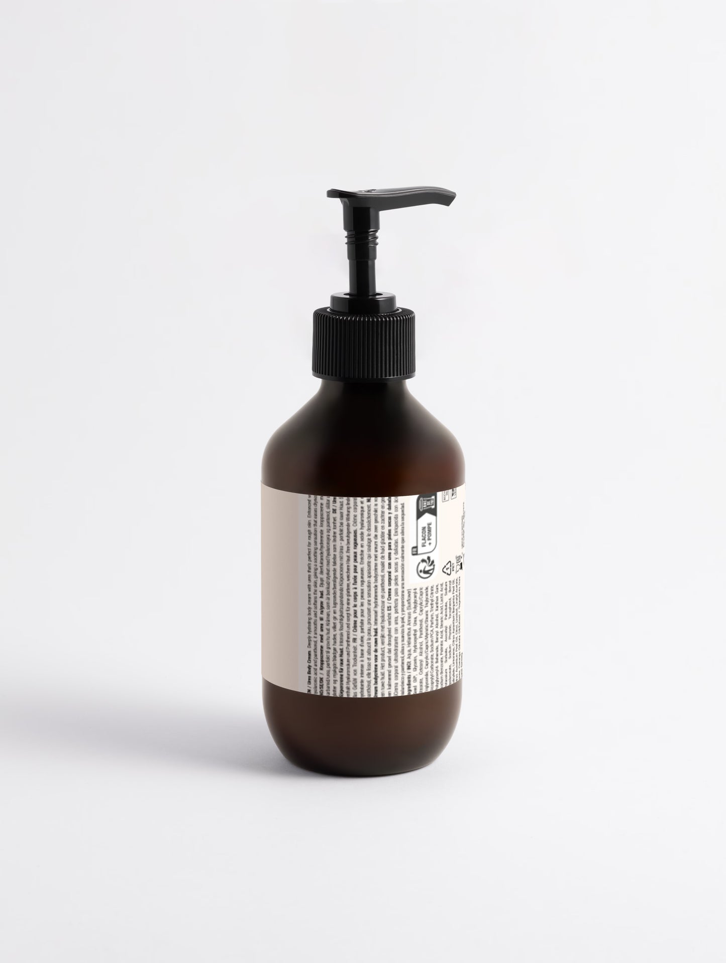 Brown bottle with pump and label on a white background