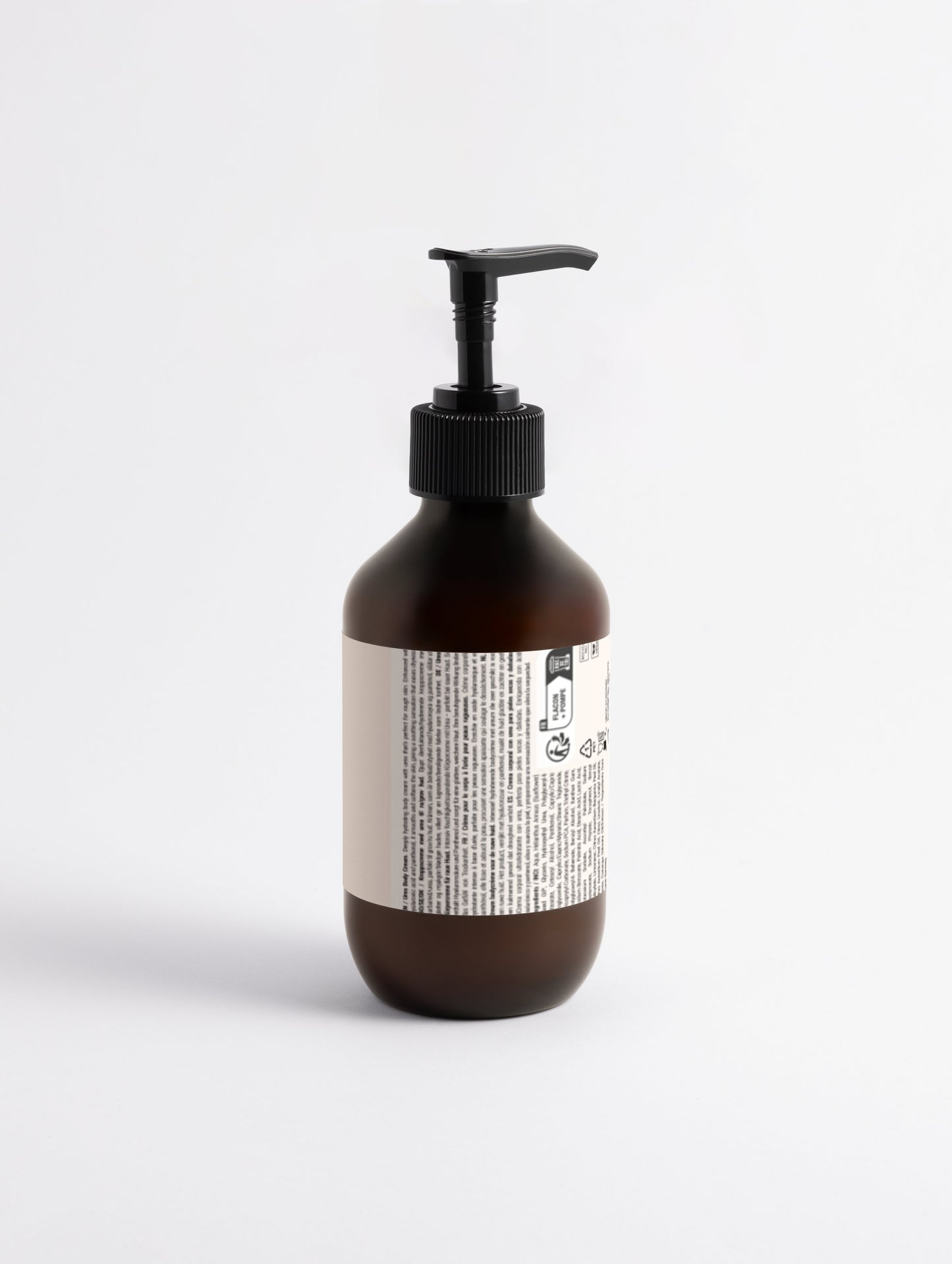 Brown bottle with pump and label on a white background