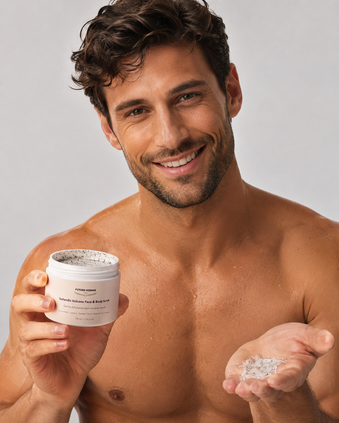 Man holding a jar and a small container of a product against a gray background