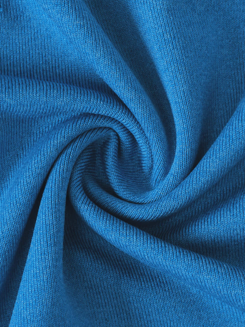Close-up of blue fabric with a swirl pattern