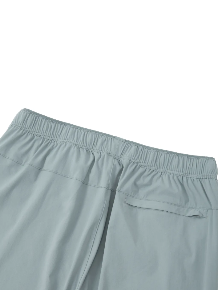 Light gray pants with an elastic waistband on a white background