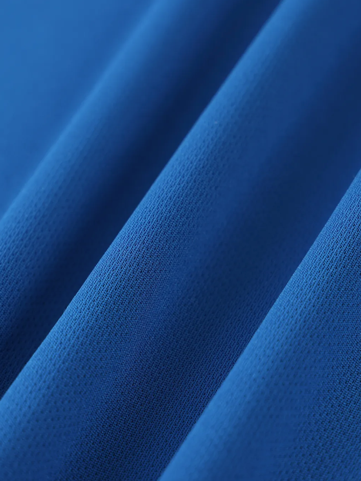 Close-up of blue fabric with a textured pattern