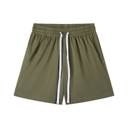 Green shorts with white drawstring on a white background