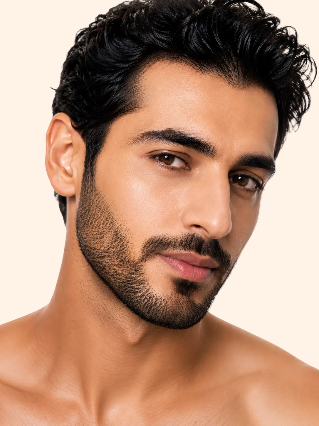 Man with a well-groomed beard and styled hair on a white background