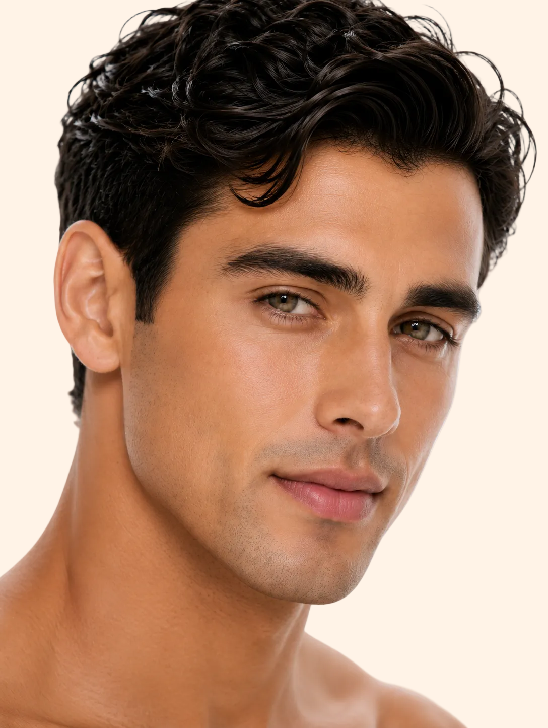 Close-up of a man with styled hair on a white background